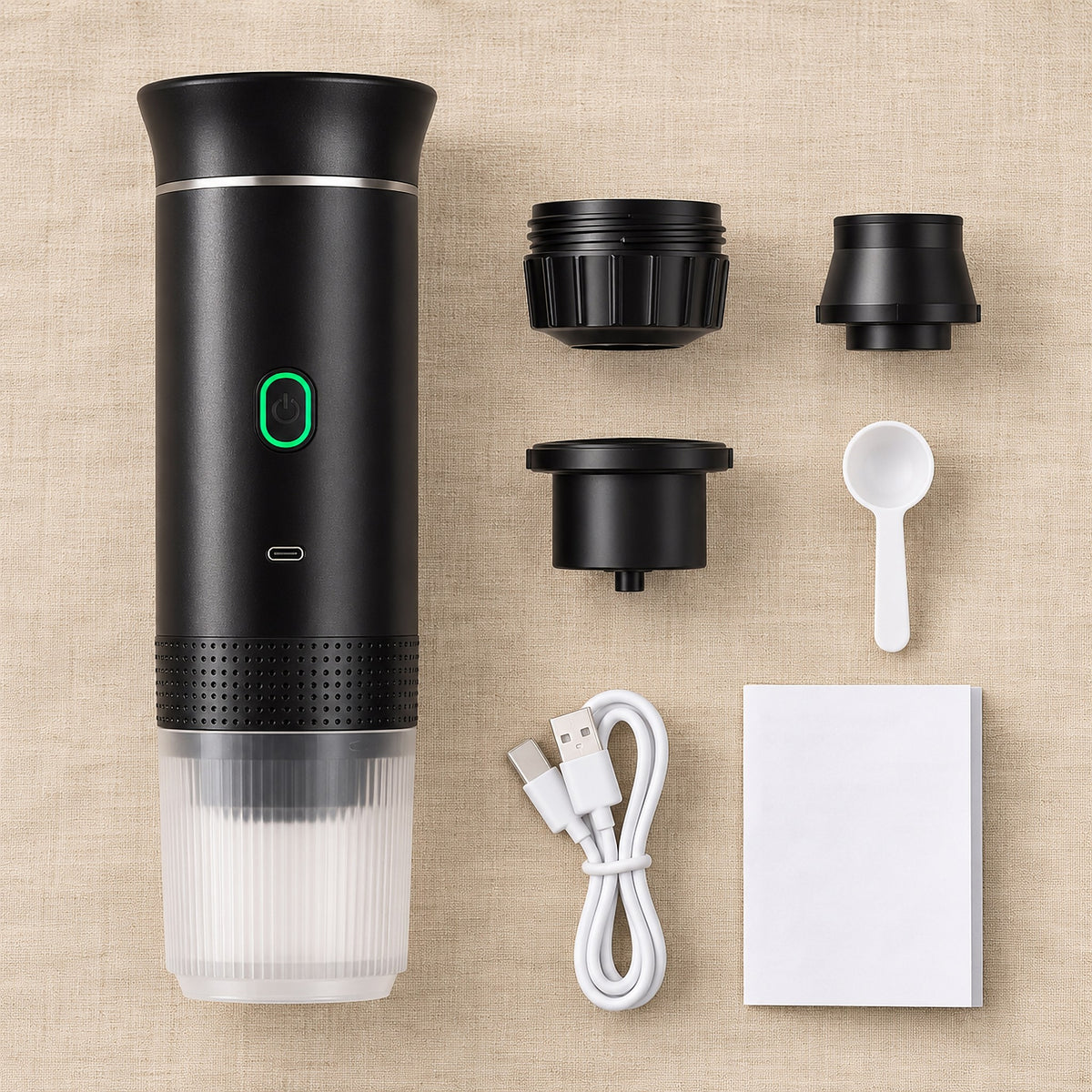 Portable espresso maker with capsule adapters, powder adapter, coffee spoon, USB-C cable and manual